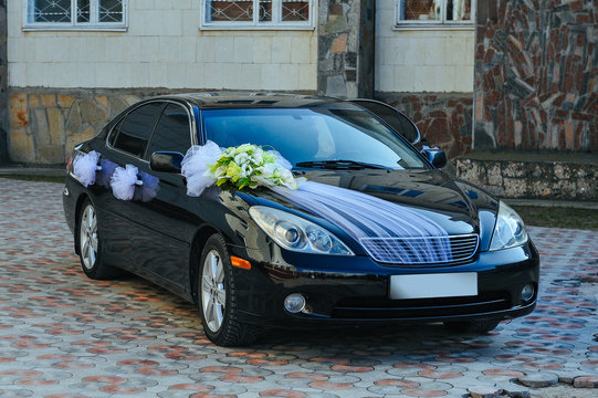 Romantic Decoration Flower On Wedding Car In Black And White