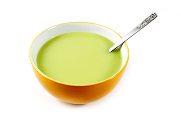 Green Pea soup in a bowl isolated