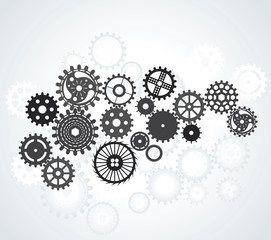 set of gears, different sizes and shapes, black on the gradient