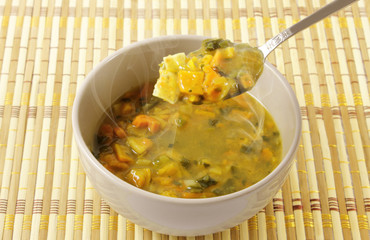 Vegetable soup and spoon