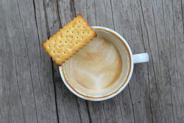 latte coffee in glass and crackers