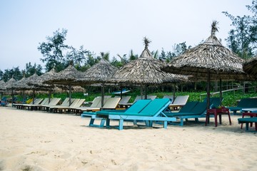 Beach chairs on the white sand beach