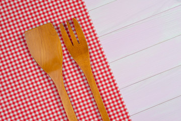 Kitchenware on red towel