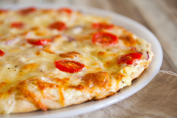 Pizza with cheese, shallow depth of field, closeup 
