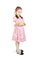 Pretty cute young girl wearing the pink dress