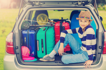 Summer vacation, young girl ready for travel