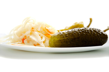 Pickled cabbage and pickled cucumber in a bowl