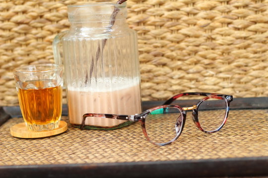Glasses with bread and tea with ice chocolate