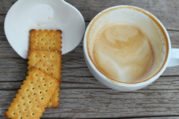 latte coffee in glass and crackers