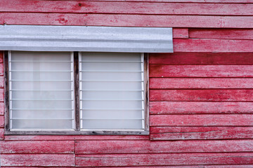 Obraz premium Old red wall with window
