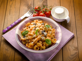 pasta with eggplant tomatoes ricotta and parmesan cheese