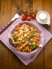 pasta with eggplant tomatoes ricotta and parmesan cheese