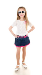 Adorable happy little girl in sunglasses posing