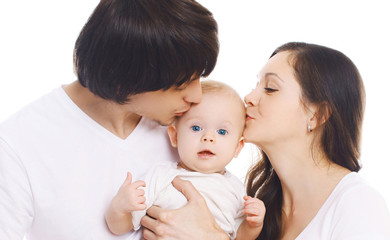Happy family, portrait of mother and father kissing baby