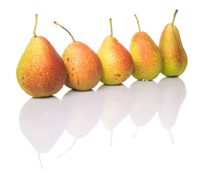 South African forelle pear fruit on wooden surface