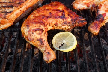 BBQ Roasted Chicken Leg Quarter On The Hot Grill © Alex