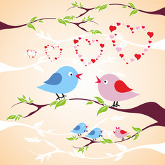 two birds in love on the branch