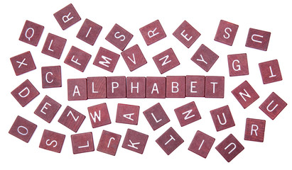 Alphabet written with little wood letters