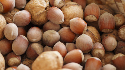 Set of various nuts in basket as a background