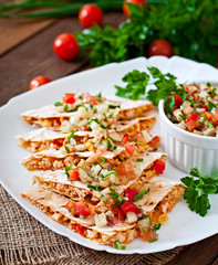 Mexican Quesadilla wrap with chicken, corn and salsa