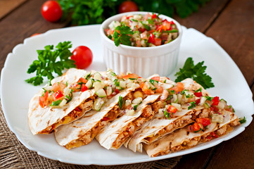 Mexican Quesadilla wrap with chicken, corn and salsa