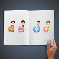 People holding buttons and printed on book