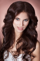 Naklejka premium Beautiful woman face makeup girl brunette studio