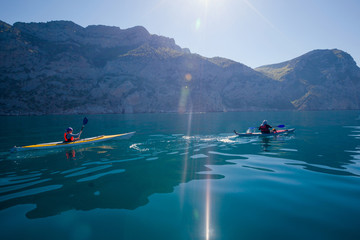 Kayak. People kayaking in sea. Activities on water.