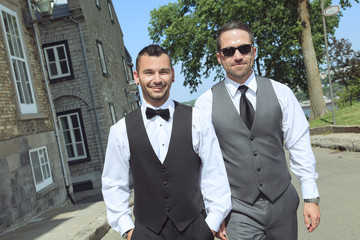 loving gay male couple on their wedding day.