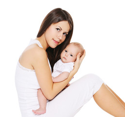 Portrait of young mother with her infant on hands