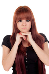 Pensive teenage girl dressed in black with a piercing