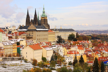 Naklejka premium First Snow in Prague City with gothic Castle, Czech Republic