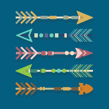 Abstract colorful tribal arrows set on blue background