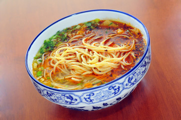 Chinese Lanzhou noodles, in a porcelain bowl.