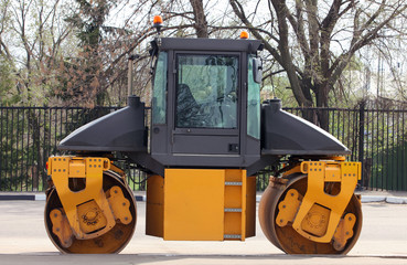 Construction, making pavement on the street of a small town