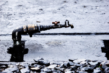 Hydrant in diesel train garage,foreground is out of focus part o