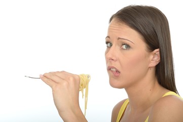 Portrait of a Young Woman Eating A fork Full of Cooked Spaghetti
