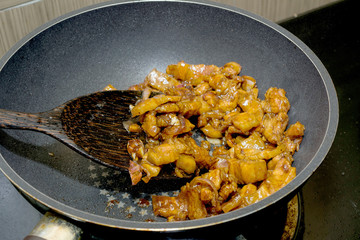 Frying pork on sauce pan