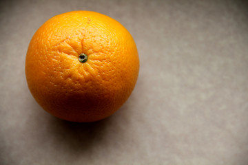 Orange fruit isolated on paper