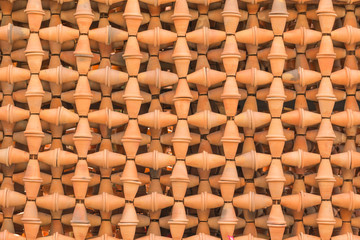 Background of jardiniere made of baked red clay