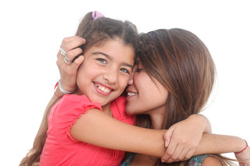 portrait of mother and daughter hugging on white background