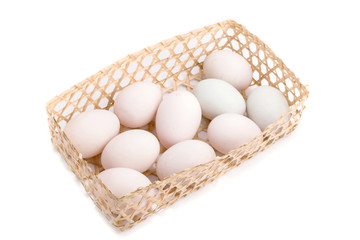 White eggs in basket