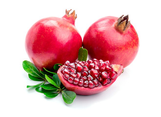 Ripe pomegranates with leaves