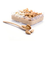 Assorted nuts in wooden spoon