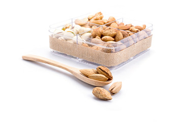Assorted nuts in wooden spoon