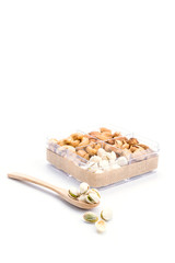 Assorted nuts in wooden spoon