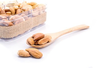 Assorted nuts in wooden spoon