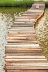 Fototapeta premium Wooden bridge along the lake