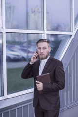 young businessman talking on the phon