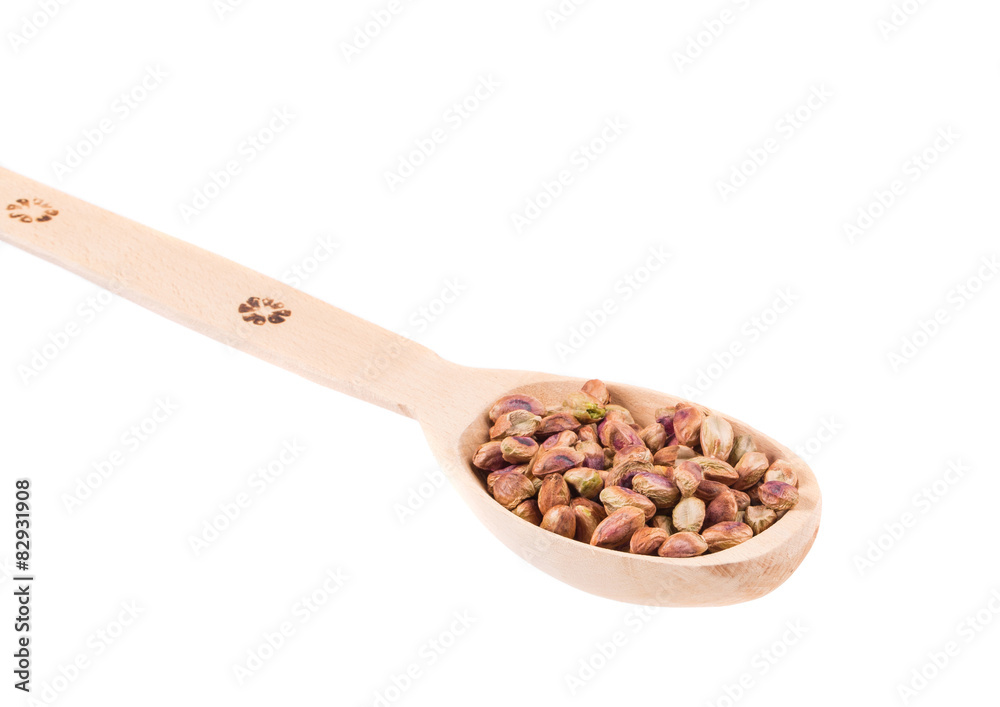 Wall mural spoon with pistachios